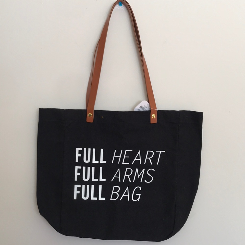 Hallmark black Tote bag with inside pocket.